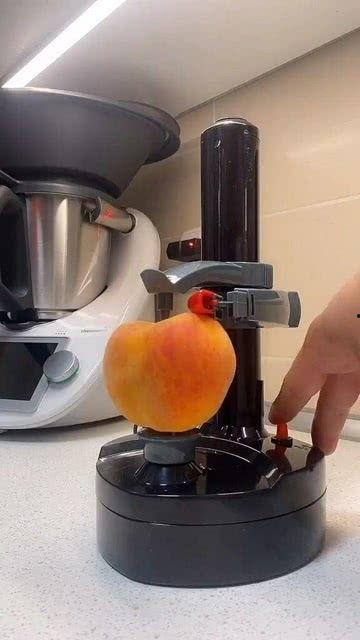 国产芒果削皮机器视频,高效便捷的果品处理新利器